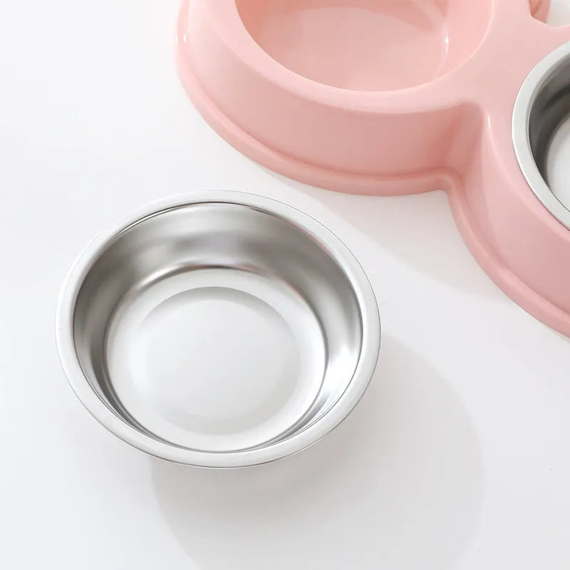 Stainless steel double pet bowl for food and water with a non-slip base and frog design, in blue colour.