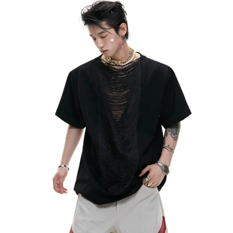 Man wearing a loose-fit drum black V-neck polyester T-shirt with short sleeves and a tassel detail.