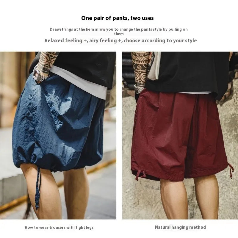 Men's Prussian blue embroidered beach shorts with loose fit and elastic waist