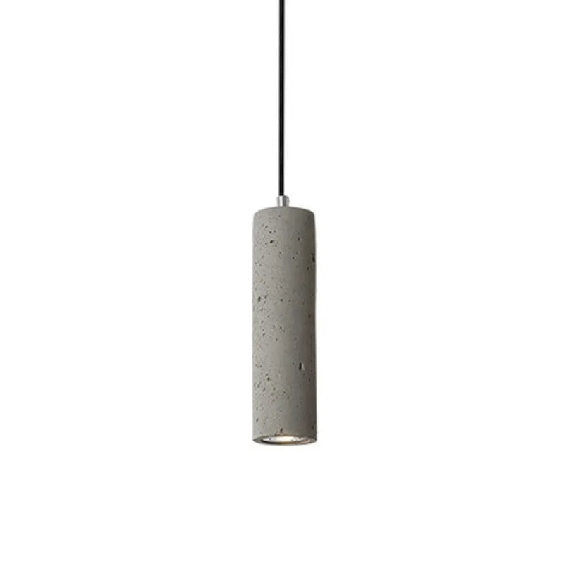 Cement industrial bedside droplight with water pipe design, glossy finish, on a wooden table