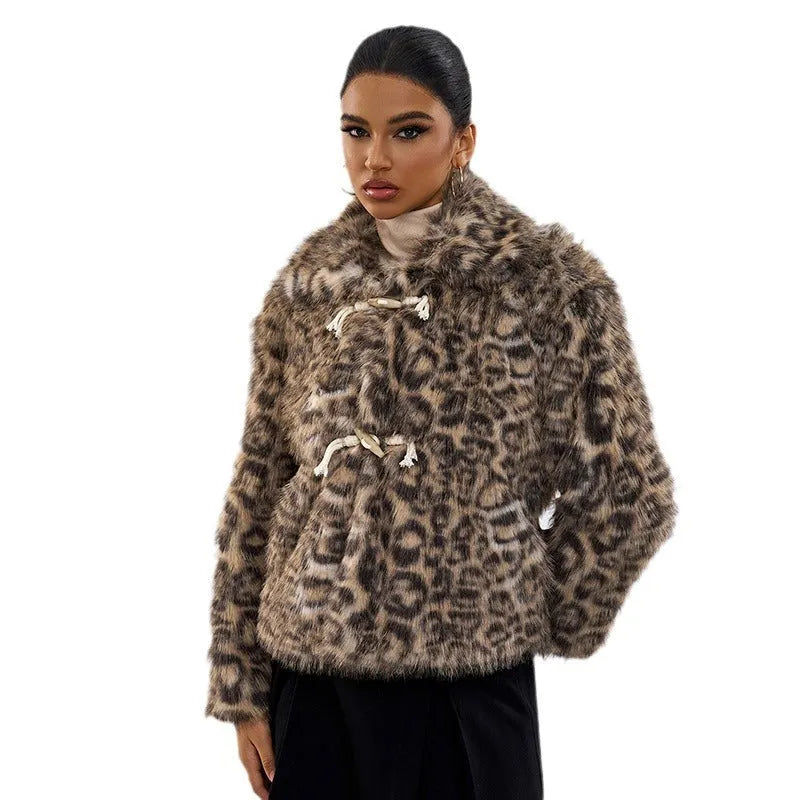 Women's leopard print coat with a buckle lapel detail on the collar