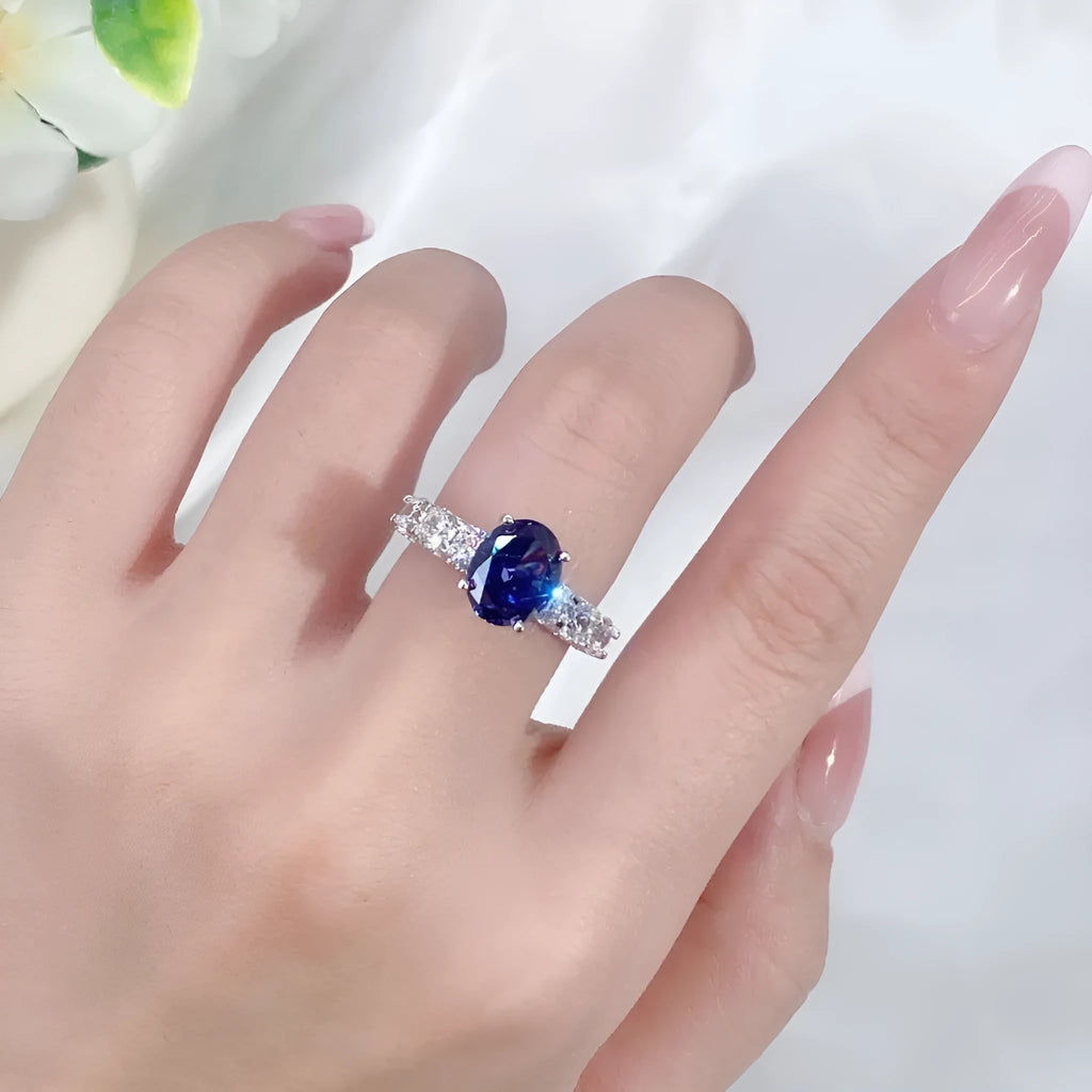 Heart-shaped sterling silver ring with a high carbon diamond ice flower cut colour zircon stone.