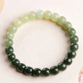 Hetian jade bracelet with sunny water gradient colour on wrist