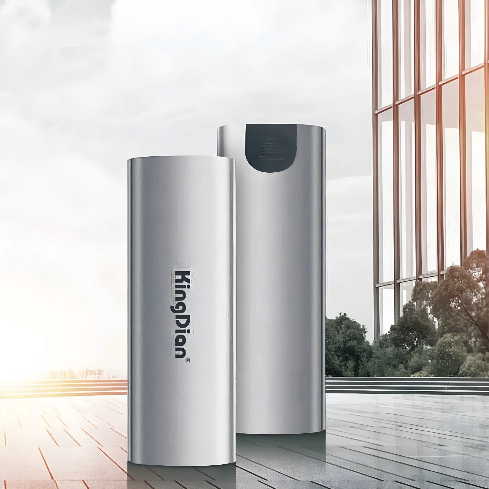 Grey aluminium mobile SSD hard drive with USB 3.0 connector for phone storage expansion.