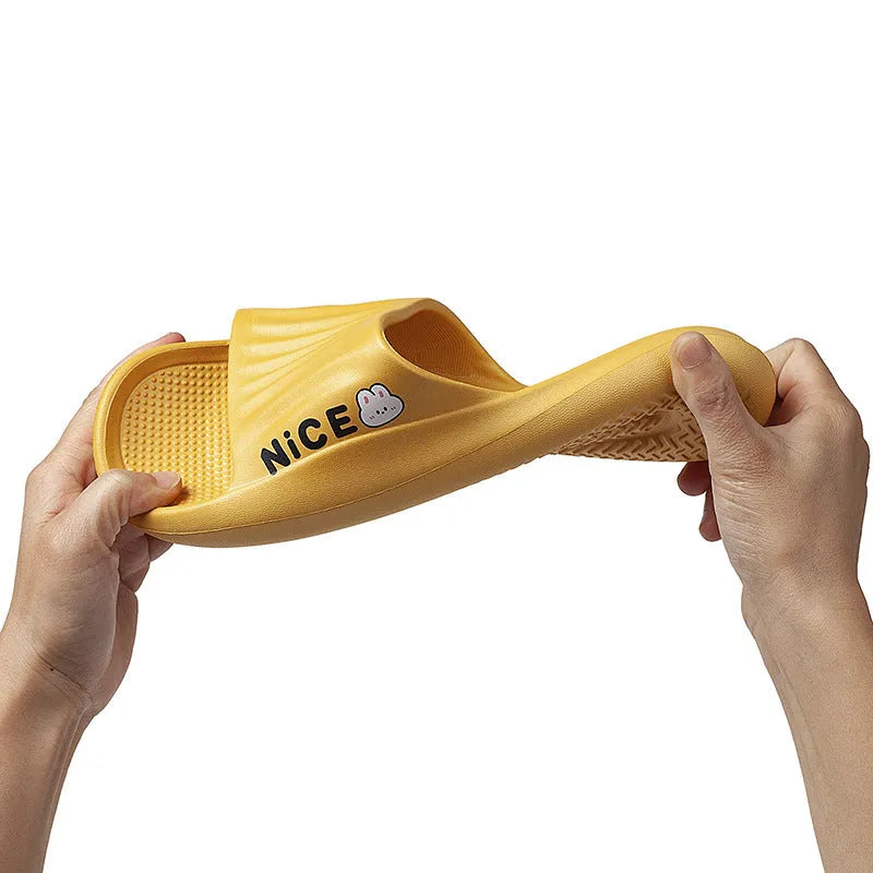 Adult unisex EVA cartoon pattern flip flop slippers in black, shown from above.