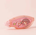Hand account dotting glue in peach juice colour on card packaging, a high viscosity double-sided adhesive.