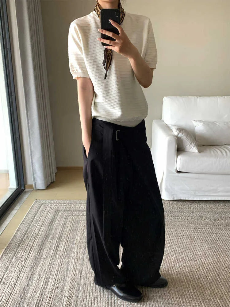 Black straight-leg trousers with adjustable waistband and single pleated front detail
