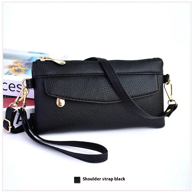 Soft PU leather crossbody bag in a square shape showing the internal sandwich zipper pocket.