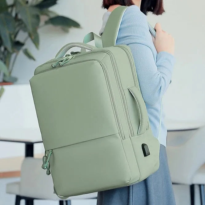 Green Oxford cloth waterproof backpack with air pillow belt straps, shown with 45x34x18cm dimensions.