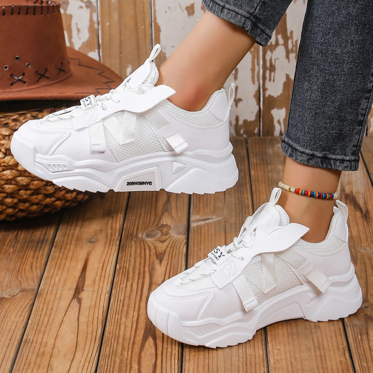 Women's green platform mesh sports shoe with lace-up front and thick sole