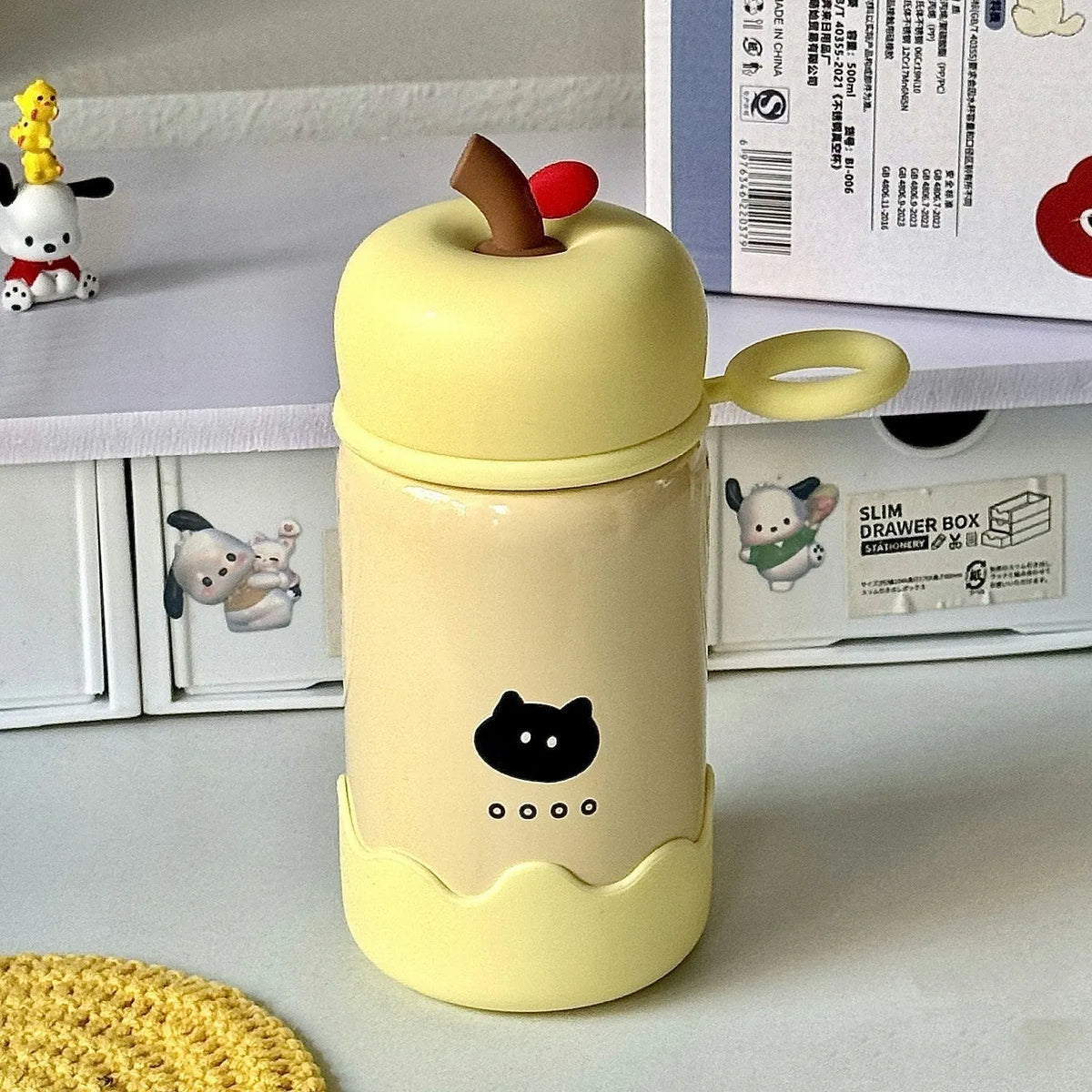Children's cartoon thermal mug 300ml with 316 stainless steel liner, rope handle, and silicone bottom pad in yellow