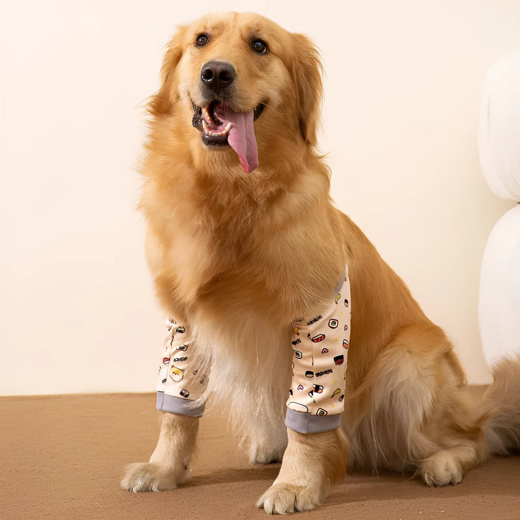 Blue dog elbow support sleeve with padded patch and matching scarf, shown with plastic buckle adjustment.