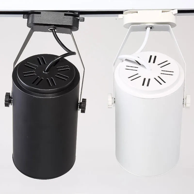 LED track spotlight with black aluminium shell mounted on lighting track