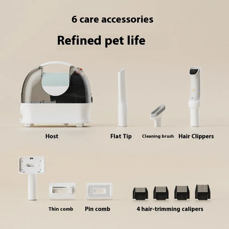 Pink and white pet grooming vacuum cleaner with electric shaver attachment and 1.4 metre hose