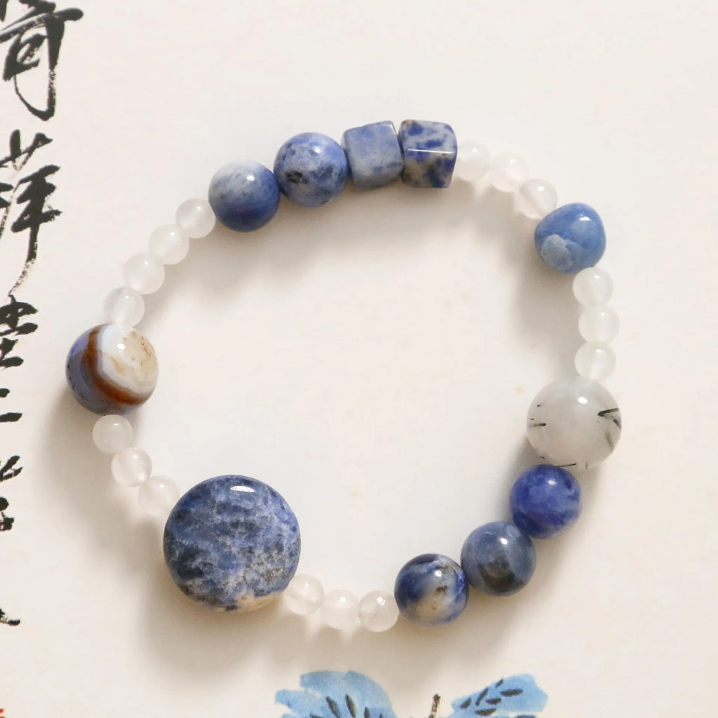Hand-woven natural stone bracelet with blue point and black hair crystal agate beads