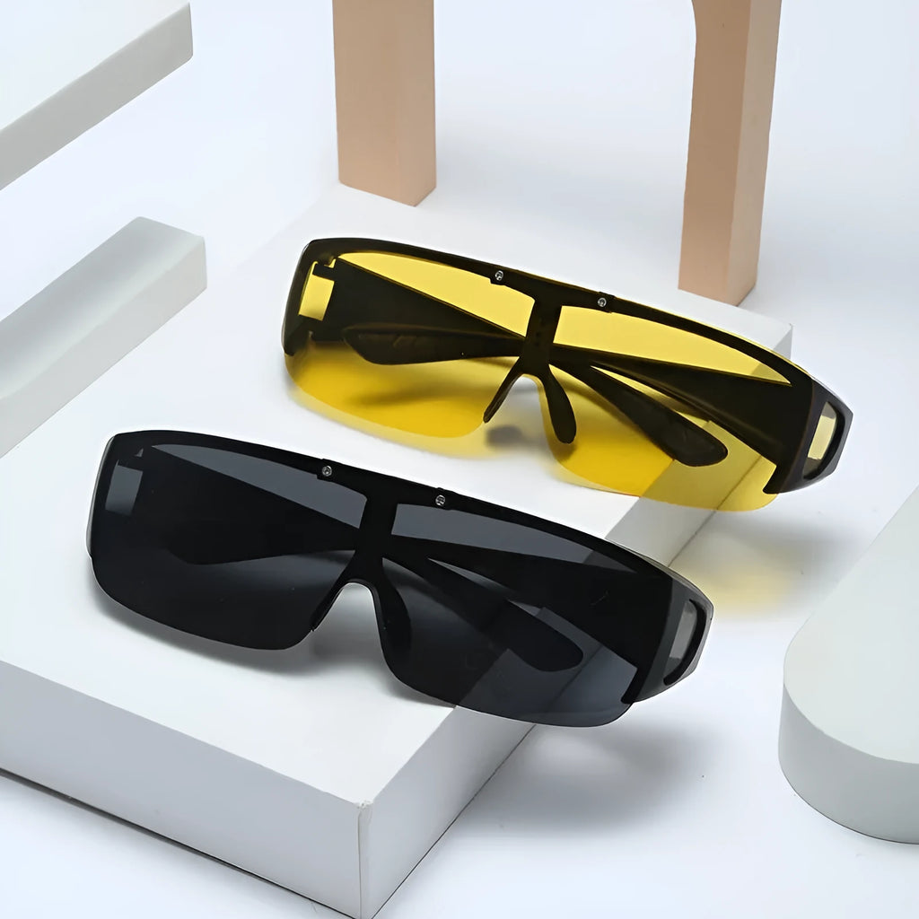 Polarised sports sunglasses with one-piece myopia correction lenses in a dark tint, suitable for cycling and climbing.