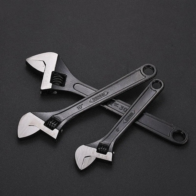 15-inch stainless steel adjustable open-end wrench with a blackened head and ergonomic handle.