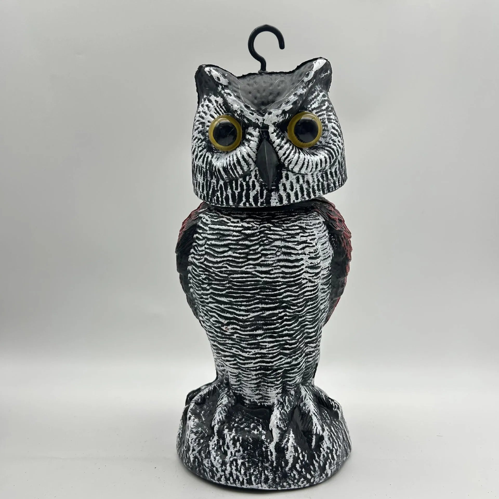 PE plastic artificial owl decoy with moving head, a bird scare ornament for outdoor use.