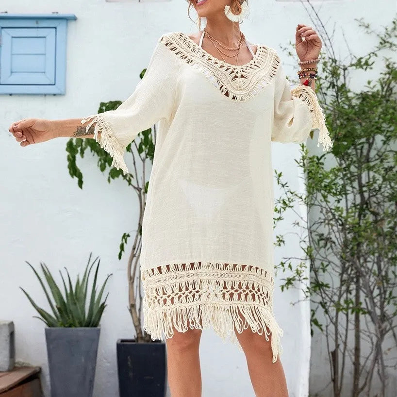Women's apricot coloured crocheted patchwork dress with half sleeves on a model.