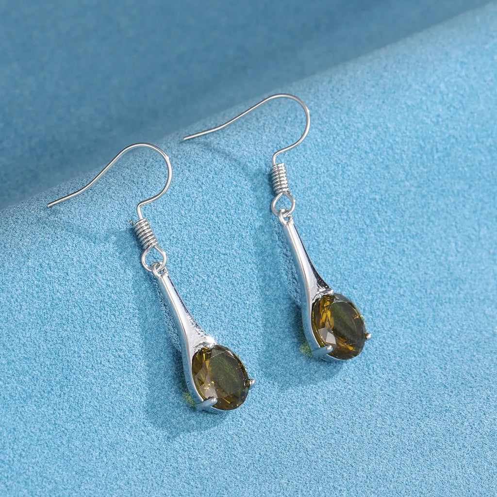 Olive green topaz drop earrings with water drop shape and retro style design