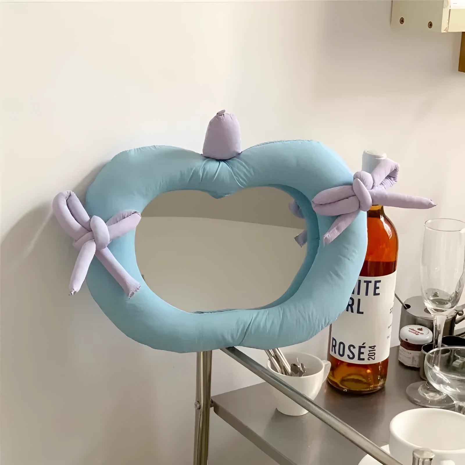 Korean-style decorative wall mirror with fabric cushion border in apple green colour