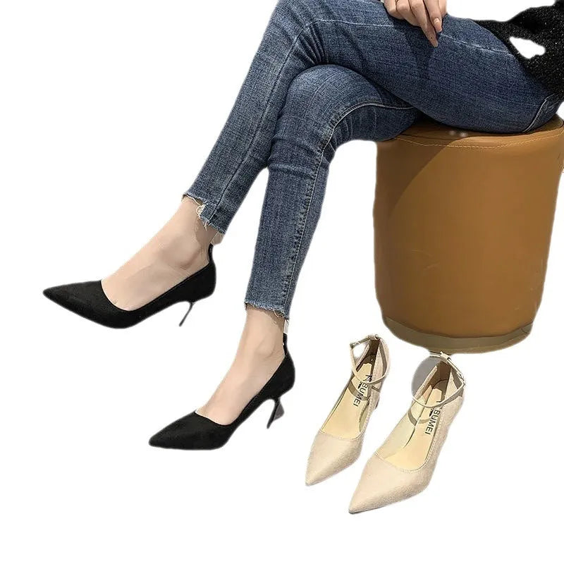 Women's black stiletto heel pump shoes with buckle detail and 8cm heel