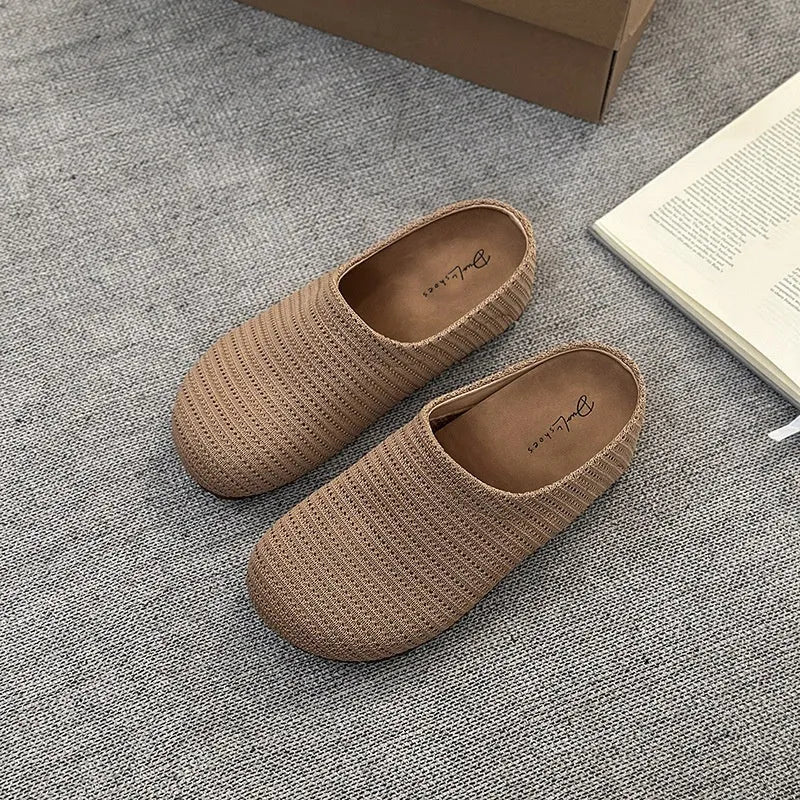 Women's baotou boken slippers in beige with a cloth upper and non-slip rubber sole.