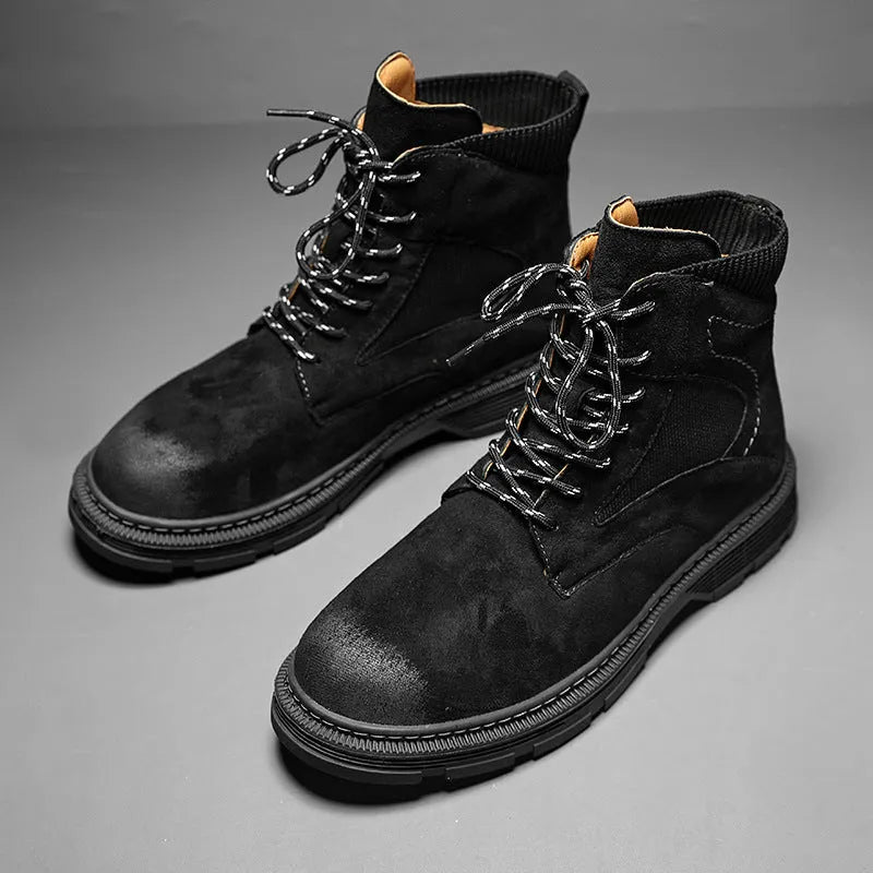Men's ankle-high Martin boots in frosted sand leather with thick rubber sole and round toe.
