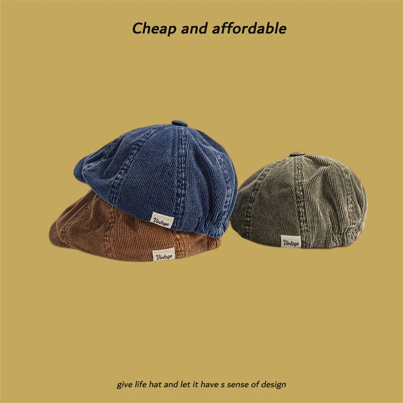 Corduroy eight-panel newsboy cap in solid colour, satin strip detail, unisex adult size
