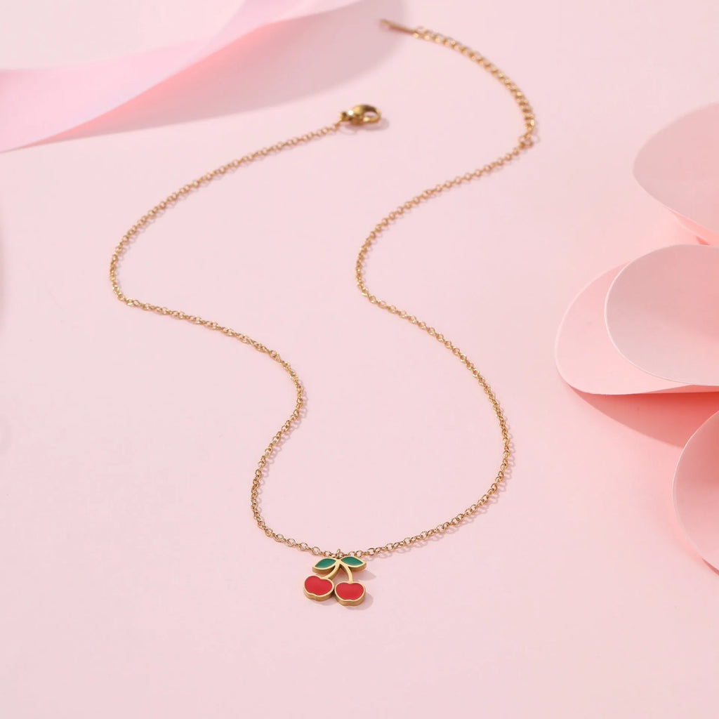 Complete cherry jewelry set with stainless steel necklace, bracelet, earrings, and ring with 18K gold electroplating.