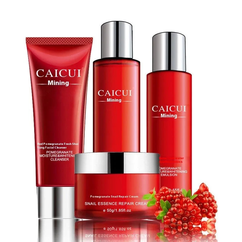 Red packaged pomegranate skincare set containing face wash, toner, lotion and facial cream bottles