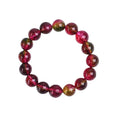 Close-up of a handmade pastel pink and green watermelon crystal bracelet for women, showing bead detail.