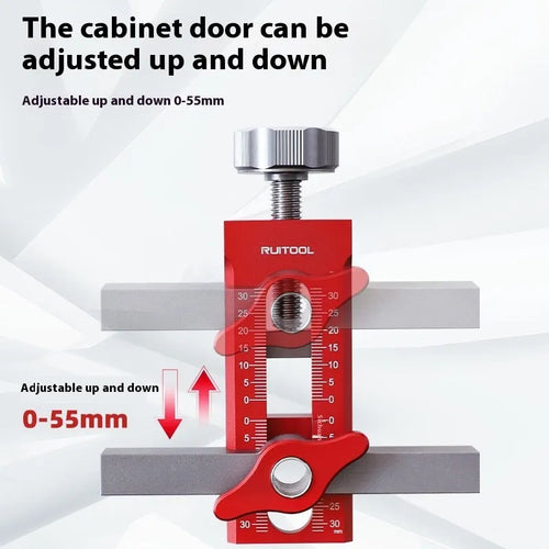Aluminium alloy cabinet door installation aid tool for woodworking projects on a workbench.
