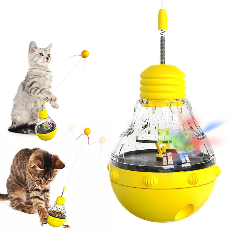 Electric yellow interactive cat toy with rocking base, teaser wand, and slow feeder dispenser