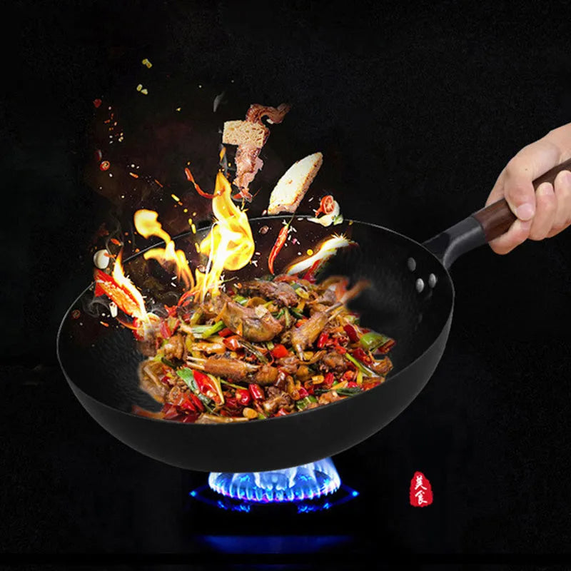 Traditional black cast iron wok with a long wooden handle, shown with a glass lid.