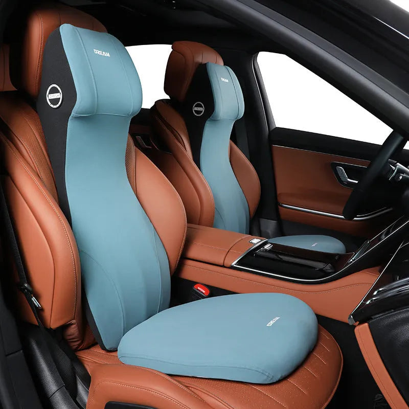 Black automotive memory foam mat showing integrated waist cushion and headrest lumbar support pillow on a car seat.