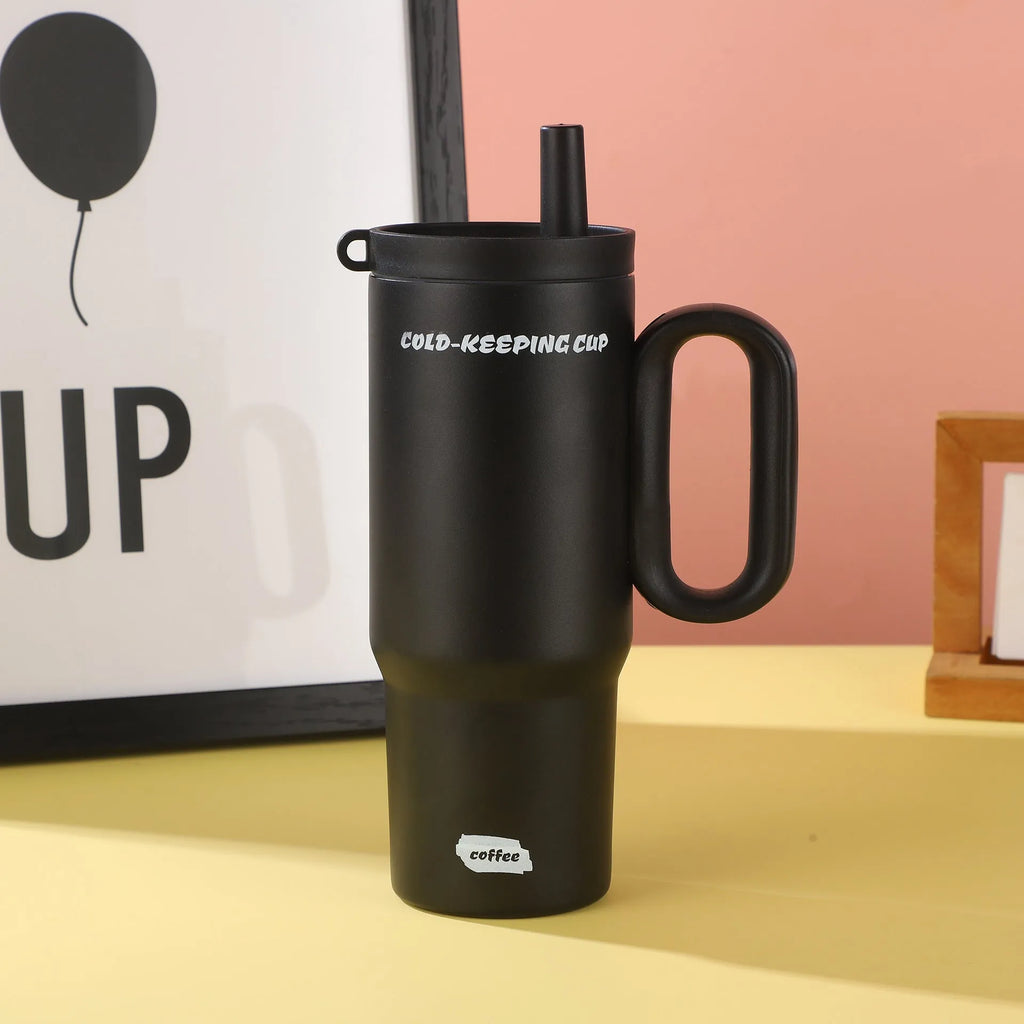 A large insulated portable cup with a handle, shown in multiple colour options.