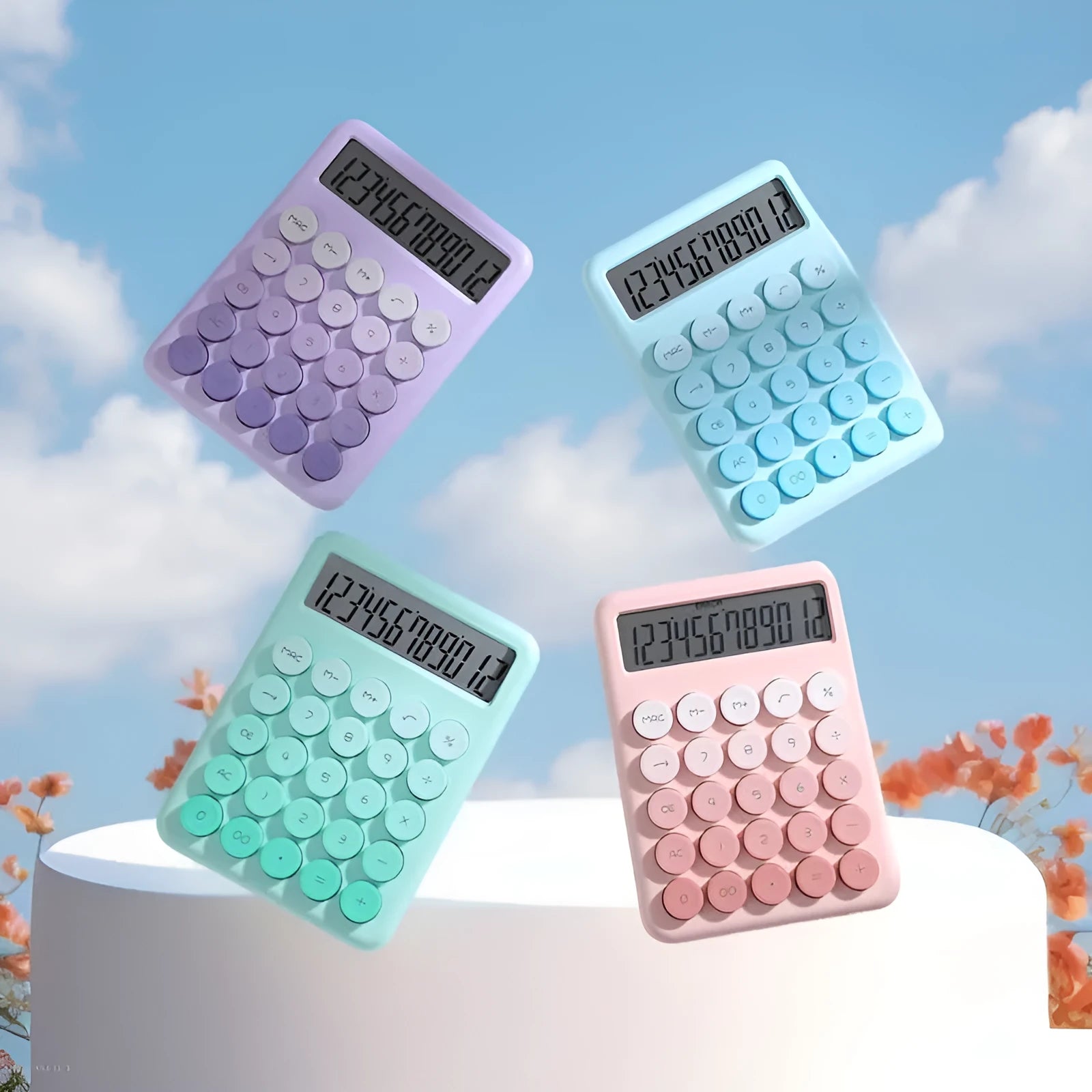 Gradient colour desktop calculator in violet, pink, blue, and green shades on a desk.