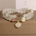 Women's Tianshan emerald green crystal bracelet with gold-plated apricot leaf pendant and rhinestones.