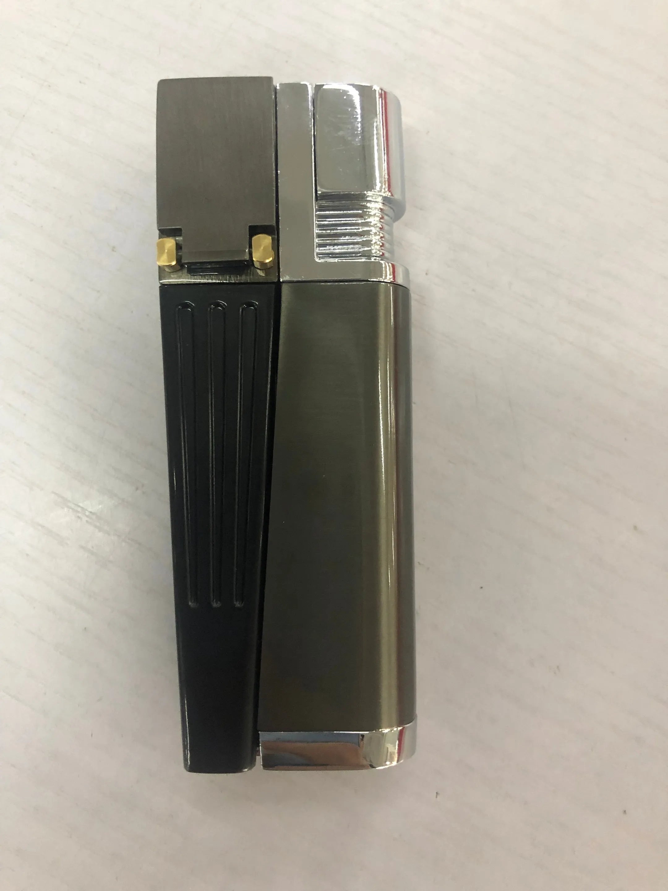 Foldable metal pipe lighter showing stash compartment and lighter mechanism in zinc alloy construction