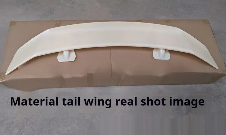 Universal punch-free car spoiler in ABS plastic shown in bright black finish.