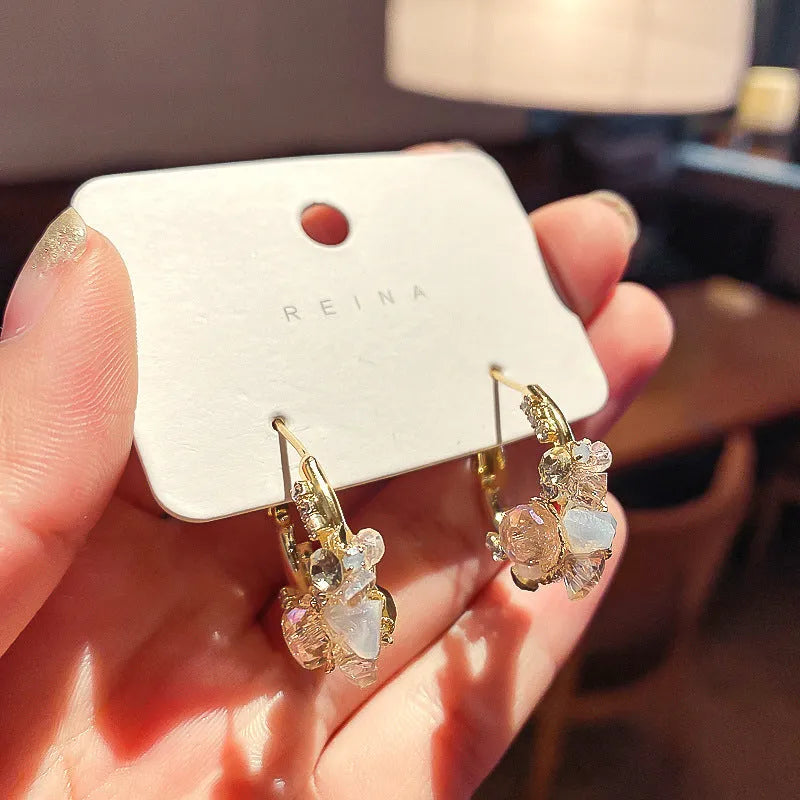 Green flower earrings with real gold plating, 925 silver needle, and diamond processing on an alloy body, gold colour