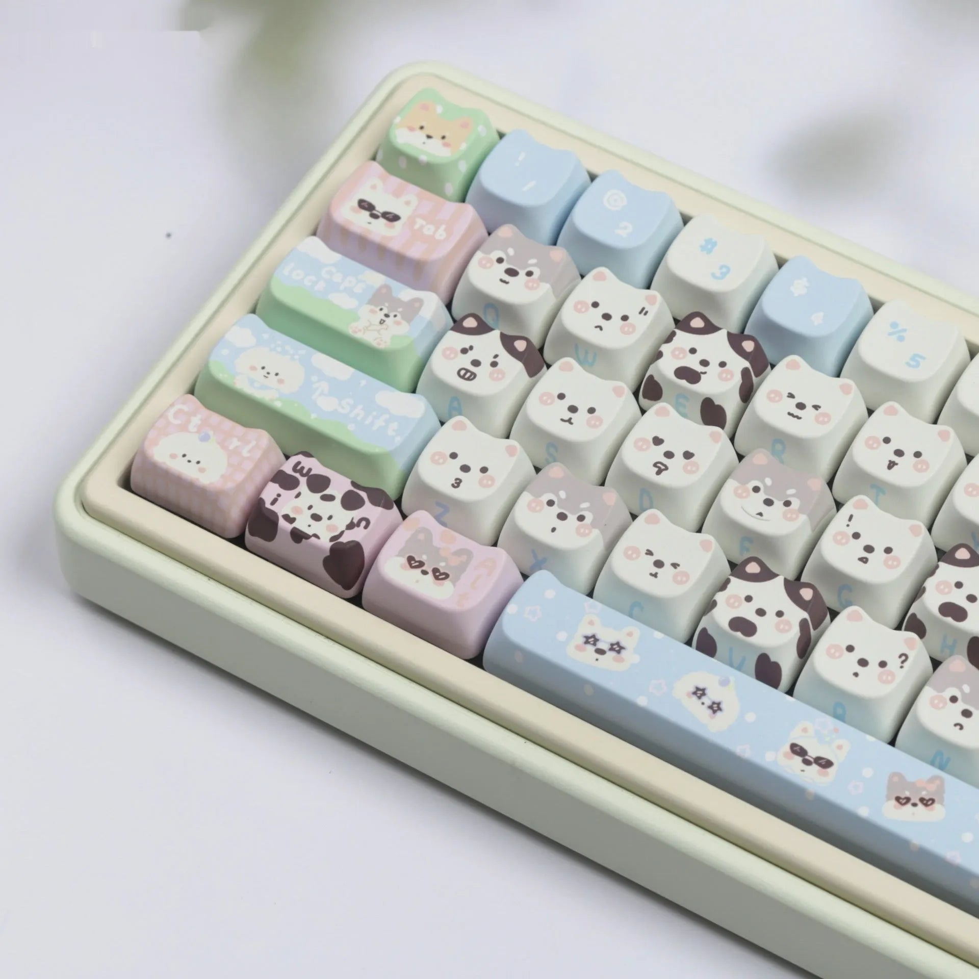 Full set of colourful anime puppy design PBT keycaps for a mechanical keyboard on a white background.