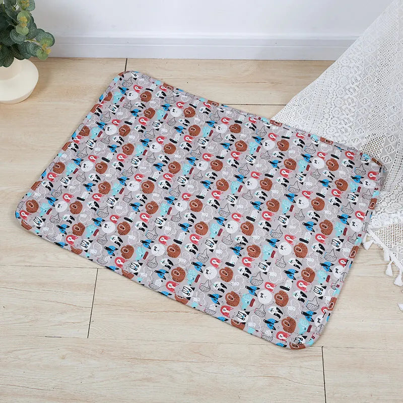 Washable waterproof pet training pad showing printed design options and size comparison