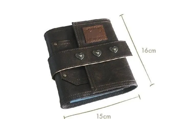 Brown retro-style A7 notebook with a PU leather-look cover and metal buckle closure, showing loose-leaf binding.
