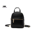 Soft PU mini backpack in street trend style with contrast colour detailing and external pocket.