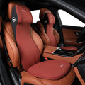 Black automotive memory foam mat showing integrated waist cushion and headrest lumbar support pillow on a car seat.