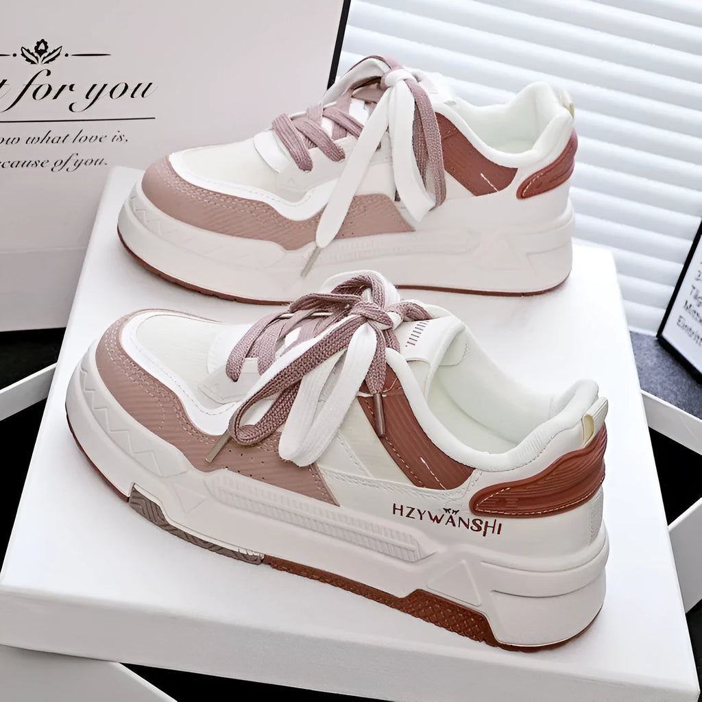 Beige children's board shoes with cross-body straps, thick rubber sole, and front laces on a neutral background.
