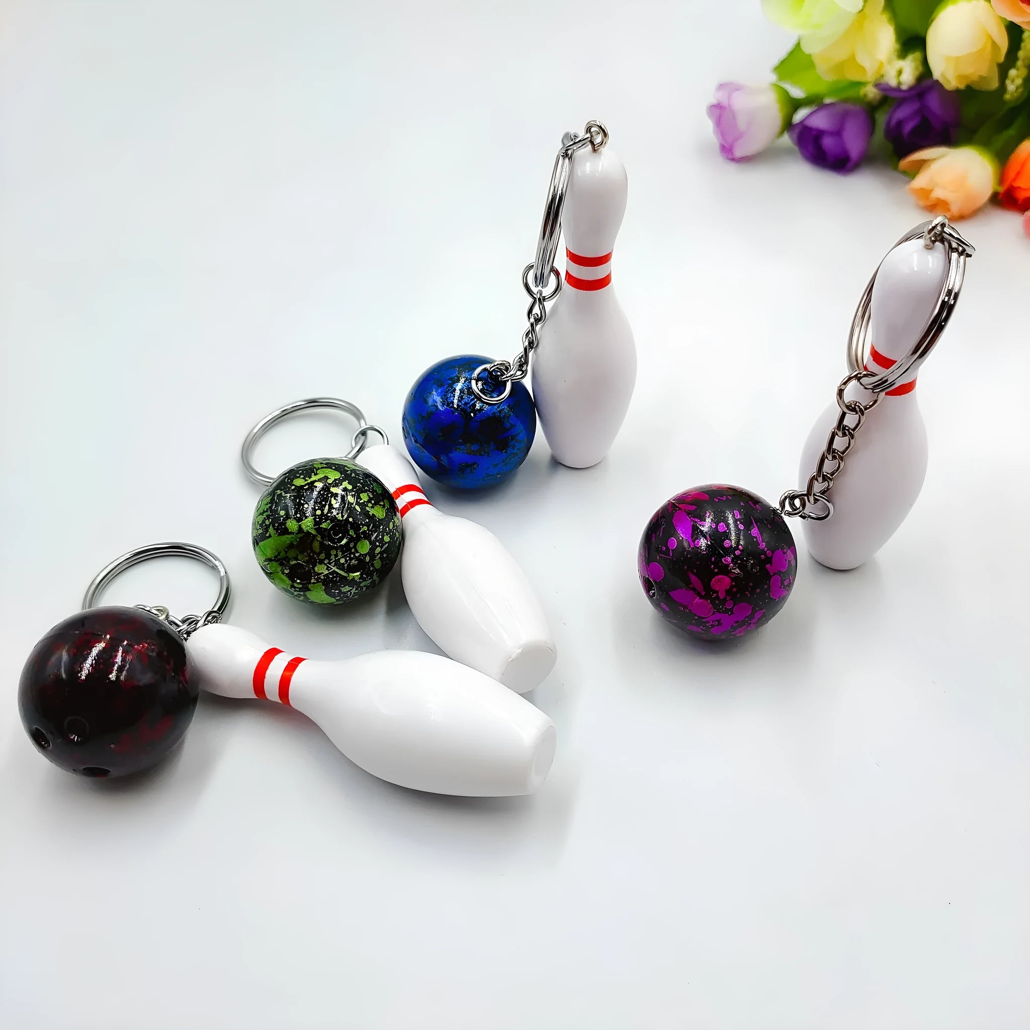 Miniature bowling alley simulation keychain pendant in blue colour with metal key ring