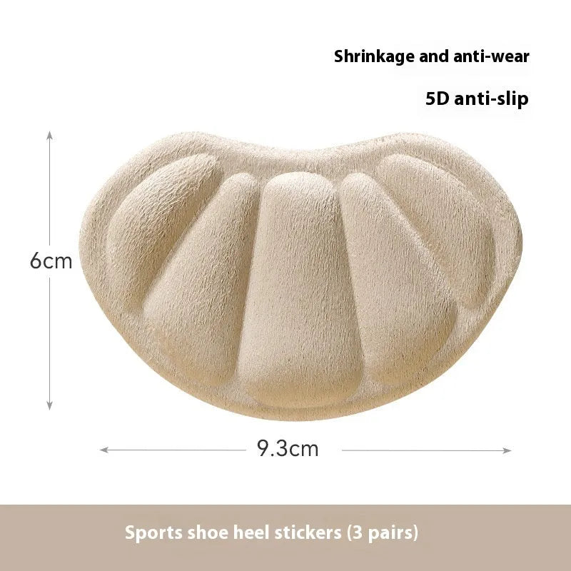 Camel-coloured suede heel cushion pads with adhesive backing for sneakers